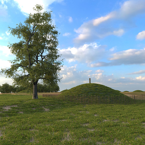Ein hallstattzeitlicher Grabhügel vor Wolken und blauem Himmel, links daneben steht ein Baum. Der Grabhügel ist typisch geschmückt mit einem Holzstamm auf der Spitze und einem Flechtzaun aus Holz drumherum.